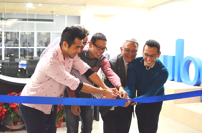 OUR FOUNDERS CUT THE RIBBON TO OUR NEW OFFICE