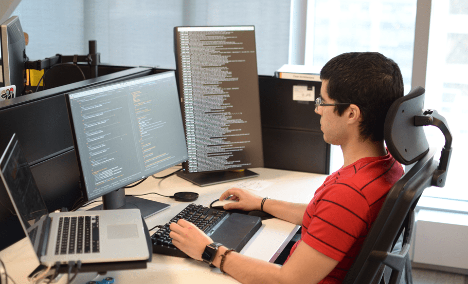 Arturo at his desk